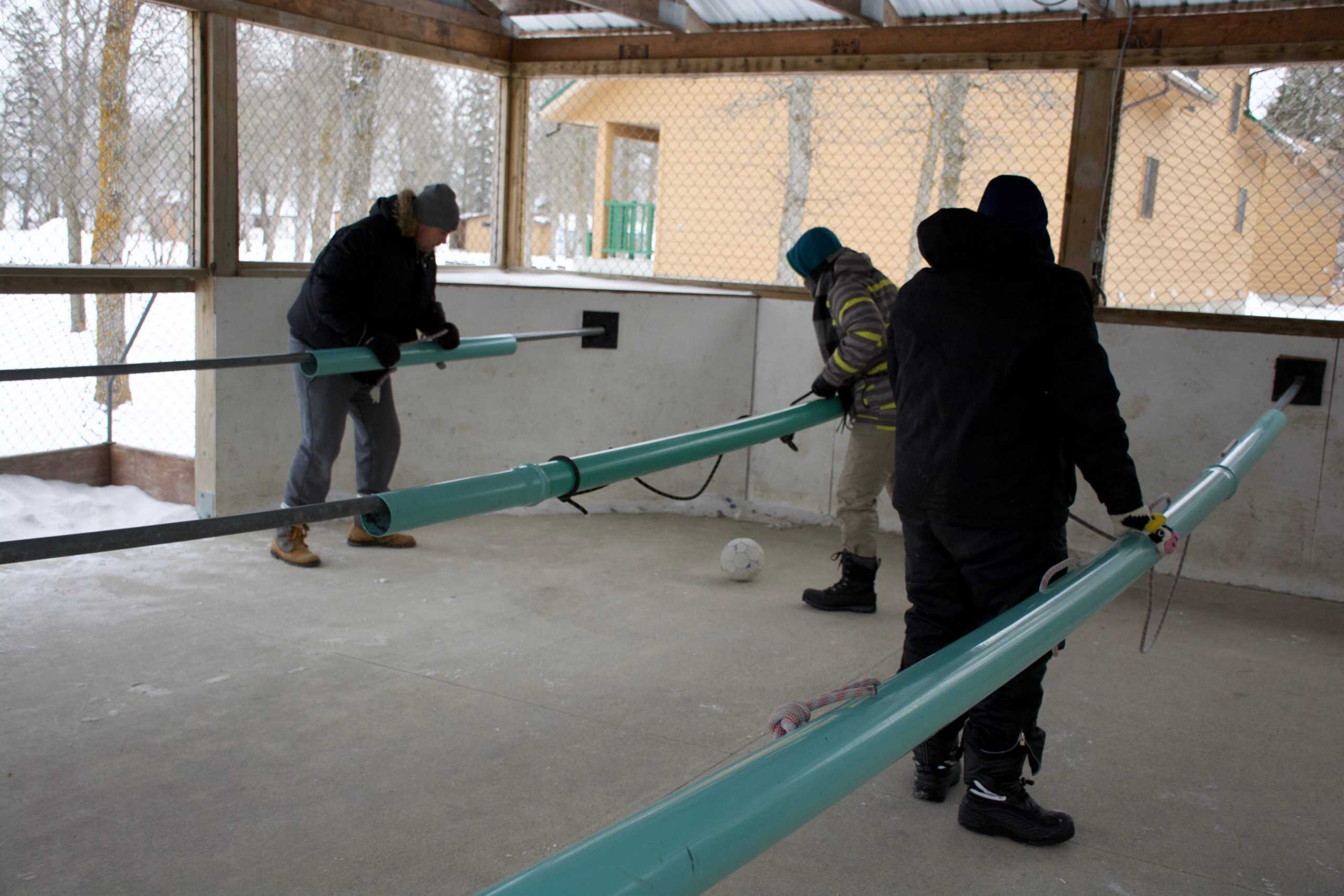 - Equipment setup at Camp Arnes outdoor activity center for winter sports and recreational games, showcasing community engagement in outdoor adventures.