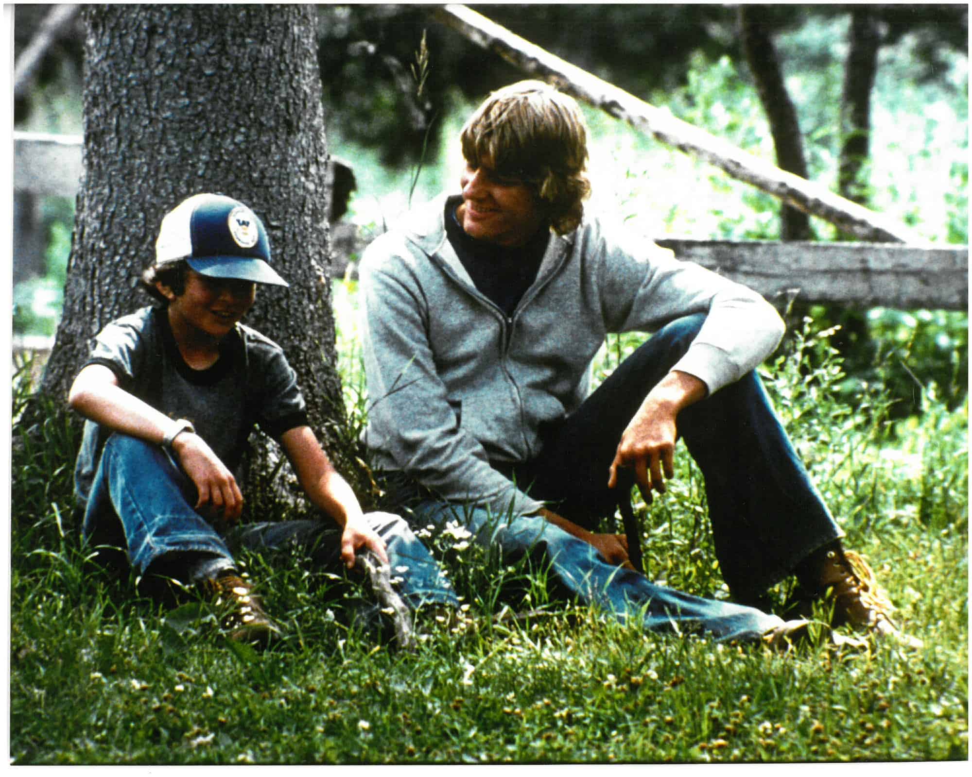 Two people under tree